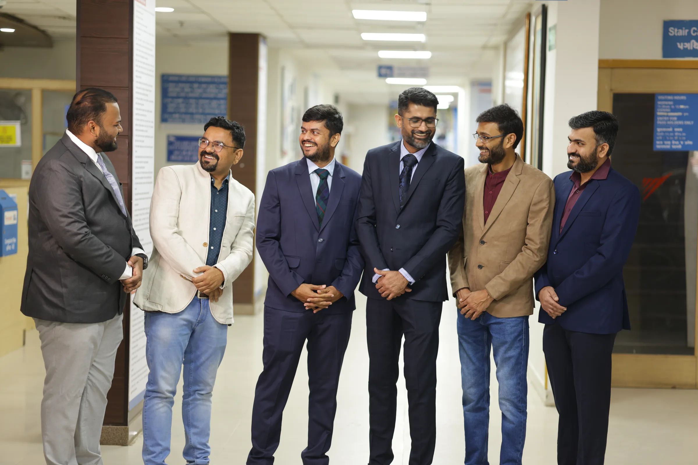 The cancer surgeons standing together in the outpatient department at Rajkot.